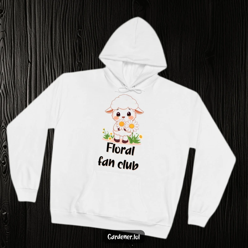 Funny Kawaii sheep gardener hoodie depicting a cheerful sheep smelling a large daisy, cozy and warm apparel.