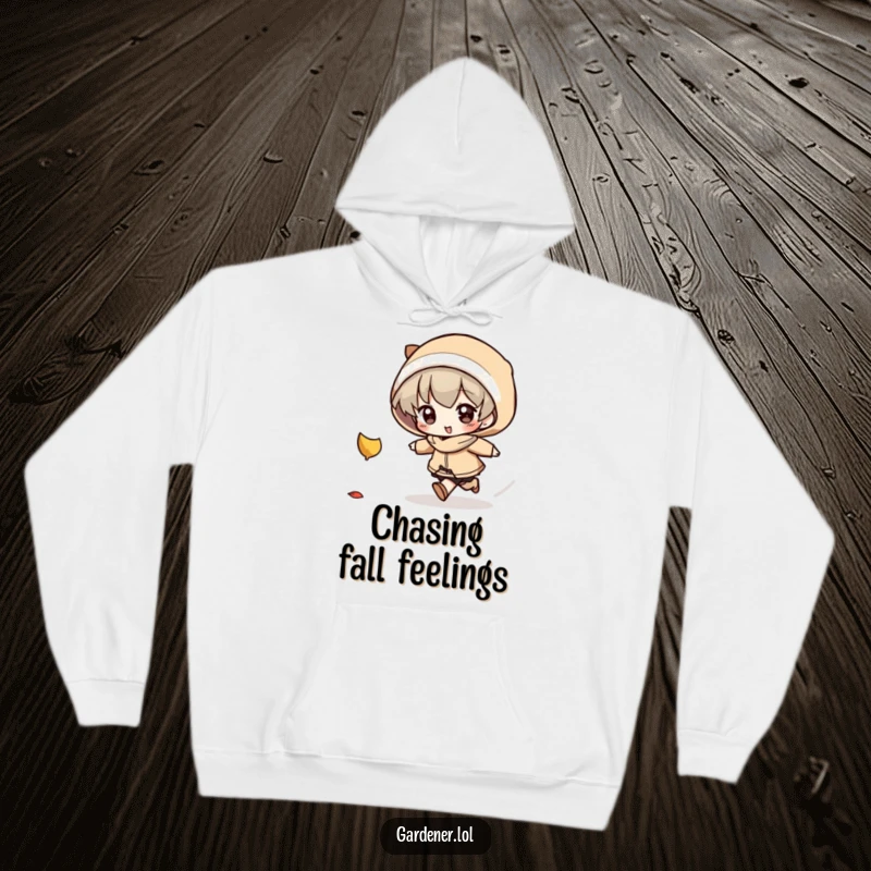 Funny Hoodie: A character is depicted mid-chase, playfully pursuing a falling autumn leaf with focused determination.