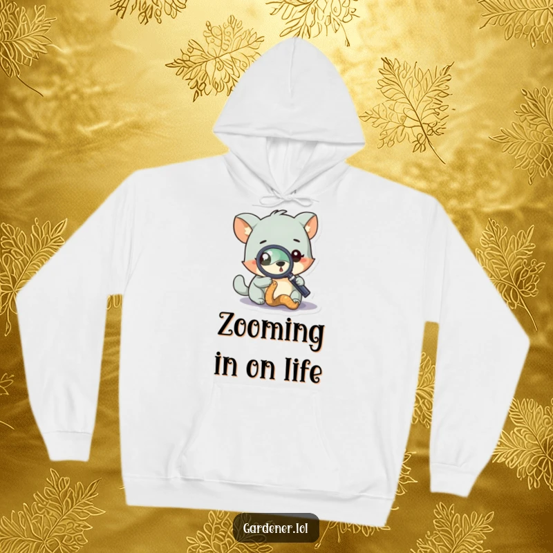 Funny hoodie showcasing a curious animal character examining a worm with a magnifying glass, promoting warmth and intellectual fun.